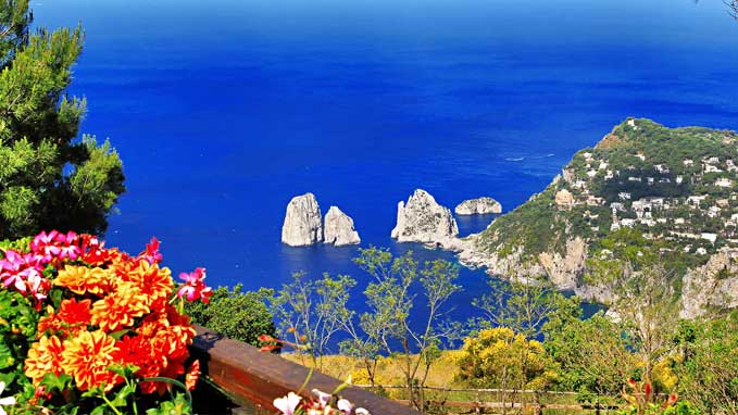The beautiful view of the Faraglioni rocks in Capri